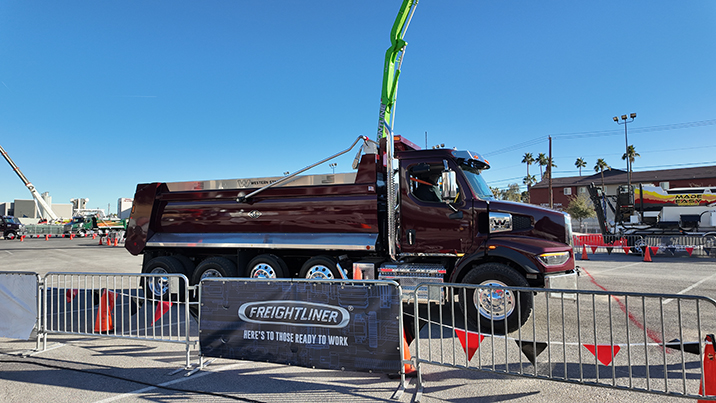 truck behind the Freighliner sign